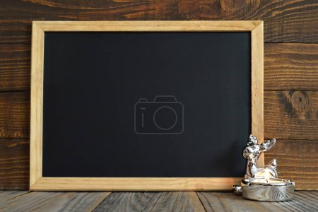 Photo for Black chalkboard with a wooden frame, copy space - Royalty Free Image