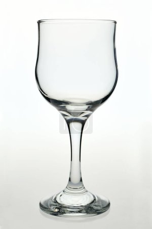 Photo for Elegant empty wineglass on white background - Royalty Free Image