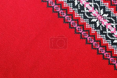 Foto de Fondo de jersey de punto rojo con patrón de invierno - Imagen libre de derechos