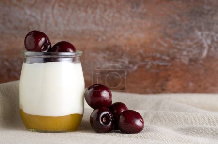 Photo for Macro Image of Nature Yogurt with Dark Cherries Horizontal - Royalty Free Image