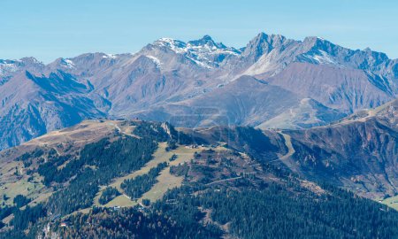 Photo for Snow covered summit of Lizumer Reckner in the background with the ridge of Penken in the front. Beautiful autumn day in Austrian Alps. Dramatic Alpine mountains scenery under blue sky. Ski resorts - Royalty Free Image