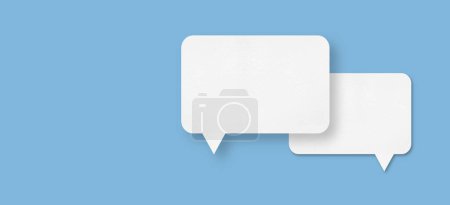 Photo for White paper with speech bubbles isolated on blue background communication bubbles design. - Royalty Free Image