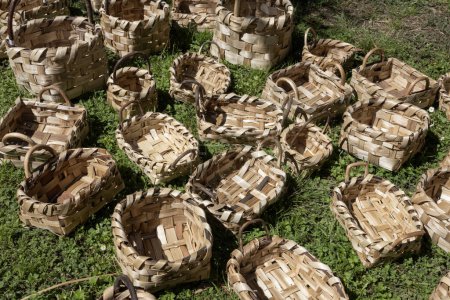 A display of handmade wicker baskets for sale at market