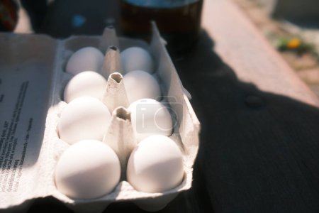 Photo for White  eggs in a paper box, close up view - Royalty Free Image