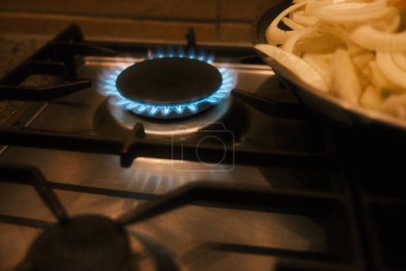 Photo for Close up view of a gas stove with a fire - Royalty Free Image