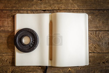 Photo for Blank notepad and pencil on wooden background - Royalty Free Image