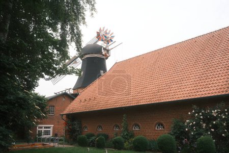amazing view of old windmill in butjadingen, germany     
