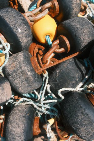 Photo for Closeup of old metal chains and rusty fishing buoys - Royalty Free Image