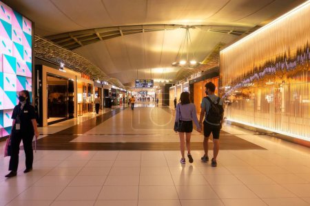 Photo for Bangkok, Thailand - July 21, 2022. A retail shopping area inside the international departure terminal at Suvarnabhumi Airport. - Royalty Free Image