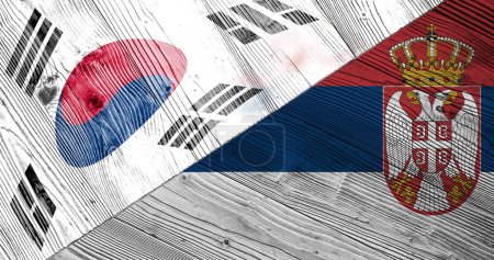 Background with flag of Serbia and South Korea on wooden split board. 3d illustration