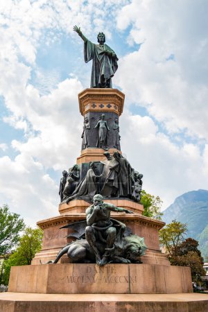 Photo for View of Dante statue located in a park in Trento 23 Aprile 2023, Trento, Trentino Alto Adige, Italy.Work of the Florentine artist Cesare Zocchi. - Royalty Free Image