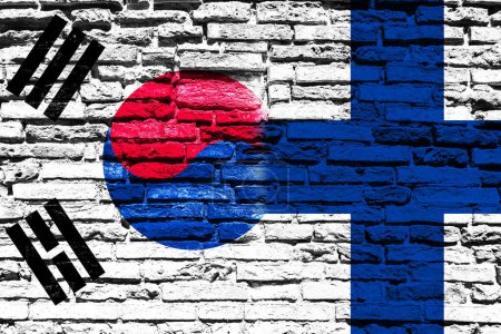 Foto de Fondo con bandera de Corea del Sur y Finlandia en muro de ladrillo - Imagen libre de derechos