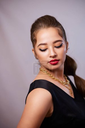 Photo for Portrait shot of a young Ukrainian woman on the background, after make-up and hairstyle, for clothing advertising. - Royalty Free Image