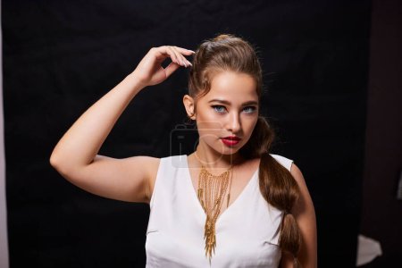 Photo for Portrait shot of a young Ukrainian woman on the background, after make-up and hairstyle, for clothing advertising. - Royalty Free Image