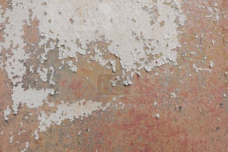 Photo for Weathered tinny surface with damages and rust. Abstract detailed texture. An old wall background painted red. Minimal urban photo. Easily add depth to your designs. - Royalty Free Image