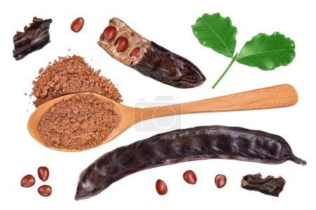 Photo for Carob pod and powder in wooden spoon isolated on white background . Top view. Flat lay. - Royalty Free Image