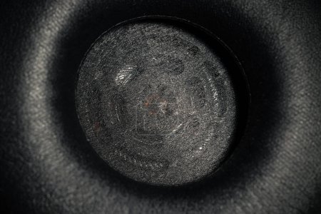 Dynamisches Audio-Gerät für Kopfhörer in Nahaufnahme Makrofotografie-Objekt mit schwarzer Lederstruktur