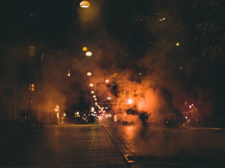 steam over night city street