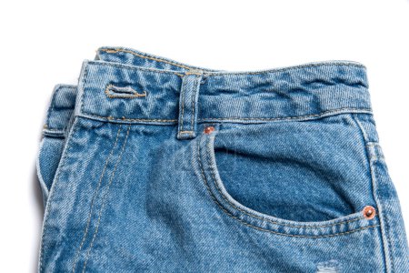 Jeans isolated on white close up, denim pocket on pants isolated