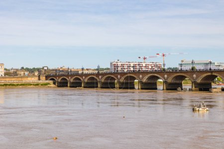 Photo for Pont de Pierre from the banks of the Garonne River - Royalty Free Image
