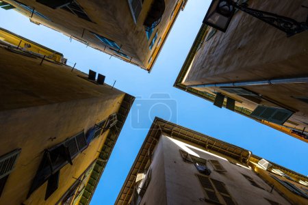 Photo for Blue sky above the intersection of two narrow streets in Old Nice - Royalty Free Image