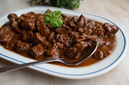 Beef goulash on a serving platter-stock-photo