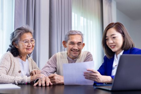 Photo for Asian senior couple got advice from lawyer on legal financial contract and insurance health care benefit for retirement home visit service professional consultant - Royalty Free Image