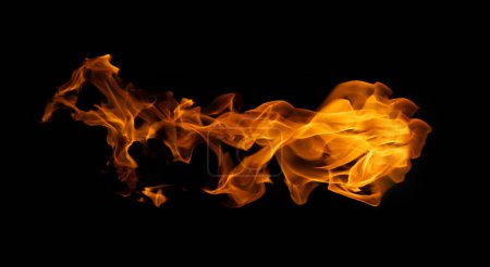 Foto de Fuego y llama ardiente de bola de fuego explosiva aislada sobre fondo oscuro para diseño gráfico - Imagen libre de derechos