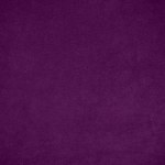 Dark purple velvet fabric texture used as background. Tone color purple cloth  background of soft and smooth textile material. There is space for text and for all types of design work