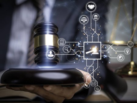 Justice lawyers with Judge gavel, Businessman in suit or lawyer Hiring lawyers in the digital system. Legal law, prosecution, legal adviser, lawsuit, detective, investigation,legal consultant..	