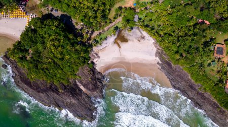 Aerial view of the beaches of Itacare, Bahia, Brazil. Small beaches with forest in the background and sea with waves.