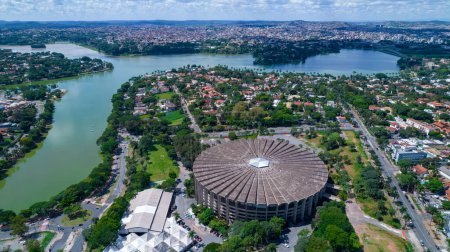Foto de Aerial view of the Mineirao football stadium, Mineirinho with the Pampulha lagoon in the background, Belo Horizonte, Brazil. - Imagen libre de derechos