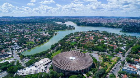 Foto de Aerial view of the Mineirao football stadium, Mineirinho with the Pampulha lagoon in the background, Belo Horizonte, Brazil. - Imagen libre de derechos