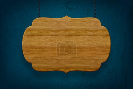 Téléchargez les photos : Panneau en bois vide sur fond bleu - en image libre de droit
