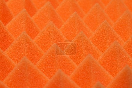 Photo for Triangular Orange Noise Dampening Foam Background Texture. Soundproofing material - Royalty Free Image