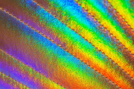 Photo for Playing surface of an artificial shell shaped bag. Metallic texture with gradual color changing. Rainbow gradient. Color transition. Visible spectrum - Royalty Free Image