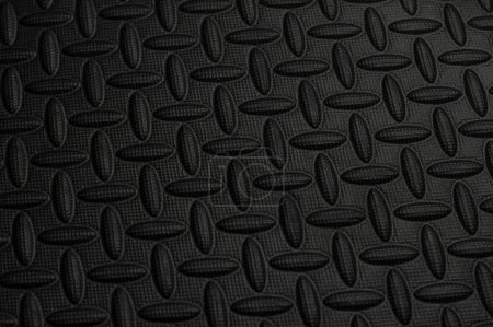 Photo for Black background of protective floor mat made of eva foam - Royalty Free Image