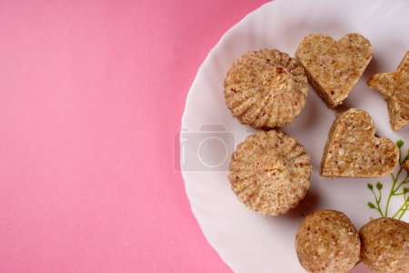 Photo for Healthy sweet groundnut or peanut and Jaggery Ladoo or balls. Delicious indian sweets served on  background - Royalty Free Image