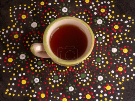 Photo for Masala tea on the ceramic black plate background - Royalty Free Image