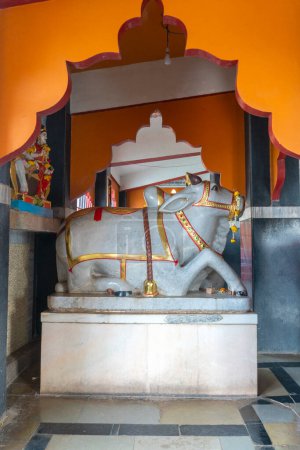 Photo for Old historical temple interior with cow statue in India - Royalty Free Image