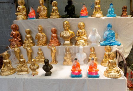 Photo for Buddha statues selling on Indian market - Royalty Free Image