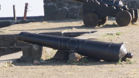 Photo for Old metal ancient cannon on the ground - Royalty Free Image