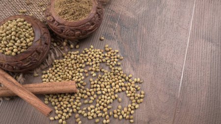 Photo for Bowls of Coriander seeds for coriander powder, Indian Spices and herbs. - Royalty Free Image