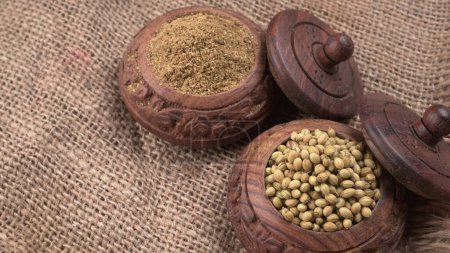 Photo for Bowls of Coriander seeds for coriander powder, Indian Spices and herbs. - Royalty Free Image