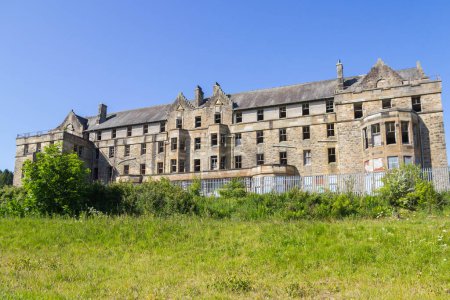 Photo for Hartwood Hospital, abandoned psychiatric asylum, Nurses Home. Derelict of Baronial-style nurses residential home, Lanarkshire, Scotland - Royalty Free Image