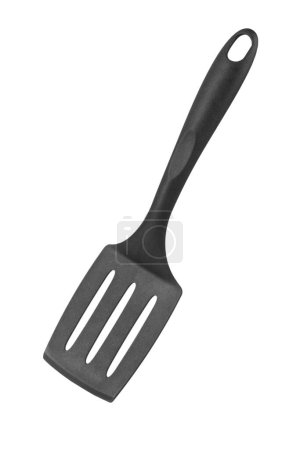 Black plastic cooking spatula isolated on white background. Kitchen utensils. File contains clipping path. 