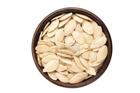 White pumpkin seeds in a plate, top view. Isolated on white background. File contains clipping path
