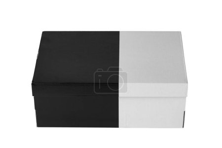 Foto de Caja de zapatos de cartón blanco y negro con tapa para zapato o zapatilla de deporte producto embalaje maqueta. El archivo contiene ruta de recorte. - Imagen libre de derechos