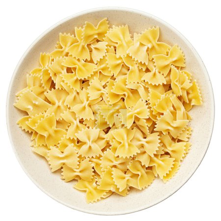 Raw farfalle pasta in a bowl isolated on white background. File Contains Clipping Path. Top view.