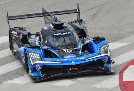 Photo for Long Beach, CA - April 14, 2023: Konica Minolta Acura Motorsport's No. 10 at the IMSA race in the Long Beach Grand Prix, an ARX-06 driven by Filipe Albuquerque and Ricky Taylor. - Royalty Free Image